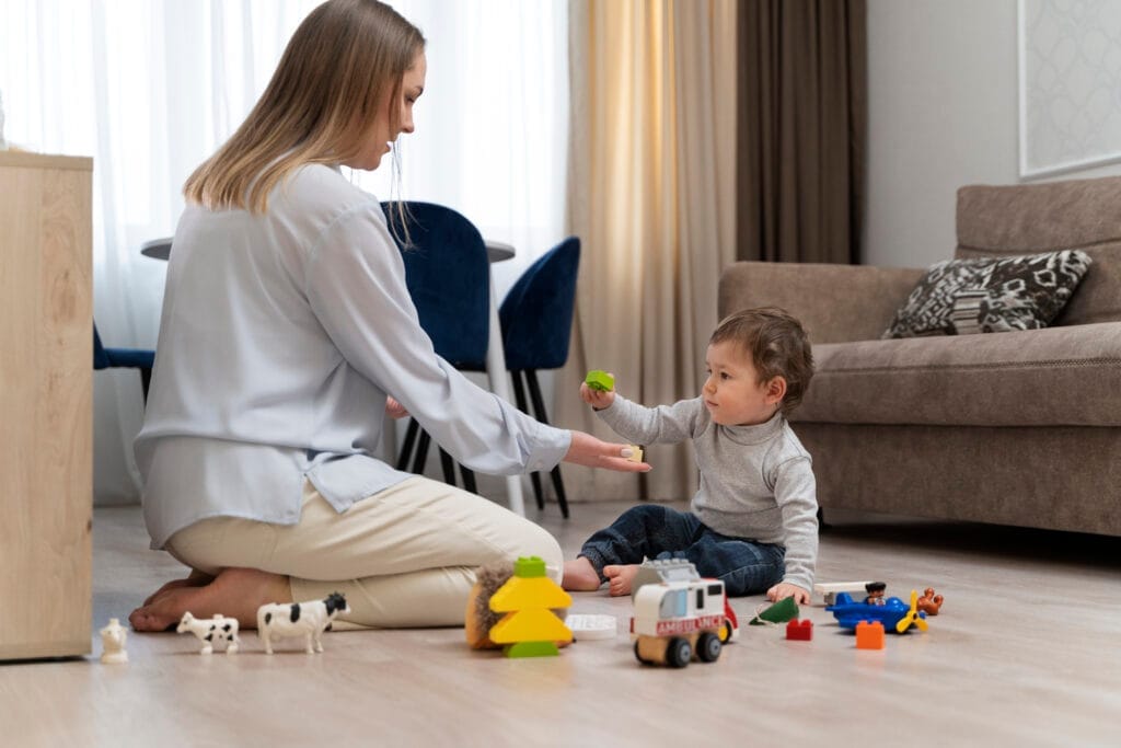 mother kid playing with toys full shot mother kid playing with toys full shot