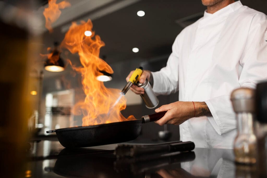 side view man cooking job Restoran Açmak İçin Gerekli Belgeler