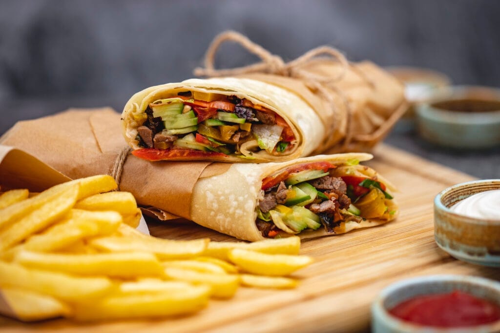 close up beef burrito with tomato cucumber lettuce jalapeno served with fries sauces Dönerci Ustalık Belgesi Nereden Alınır