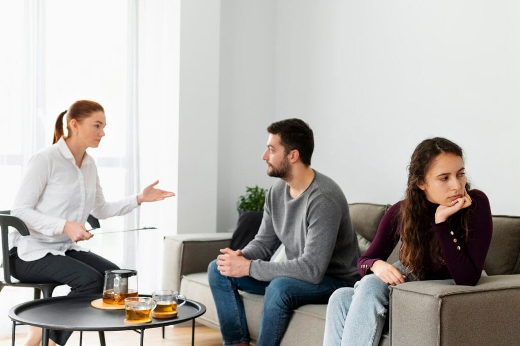 medium shot sad woman therapy Aile Danışmanlığı Sertifikası Nasıl Alınır