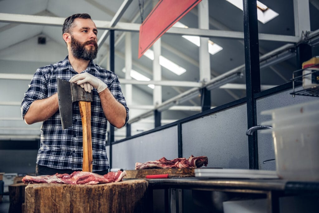 portrait bearded meat man dressed fleece shirt holds axe fresh cut meat Kasaplık Belgesi Sınavsız Nasıl Alınır