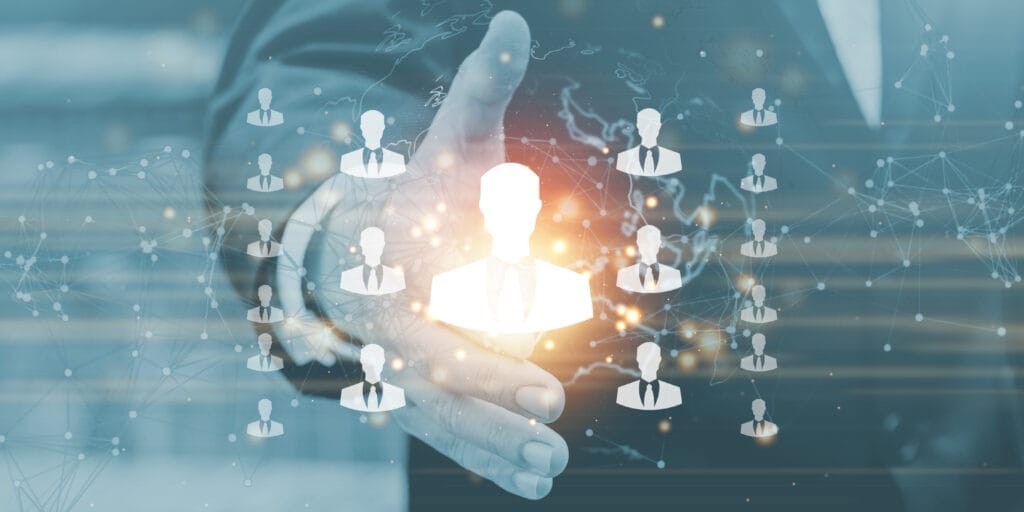 businessman blurred background with people connection icon business leadership chart Liderlik eğitimi nedir?