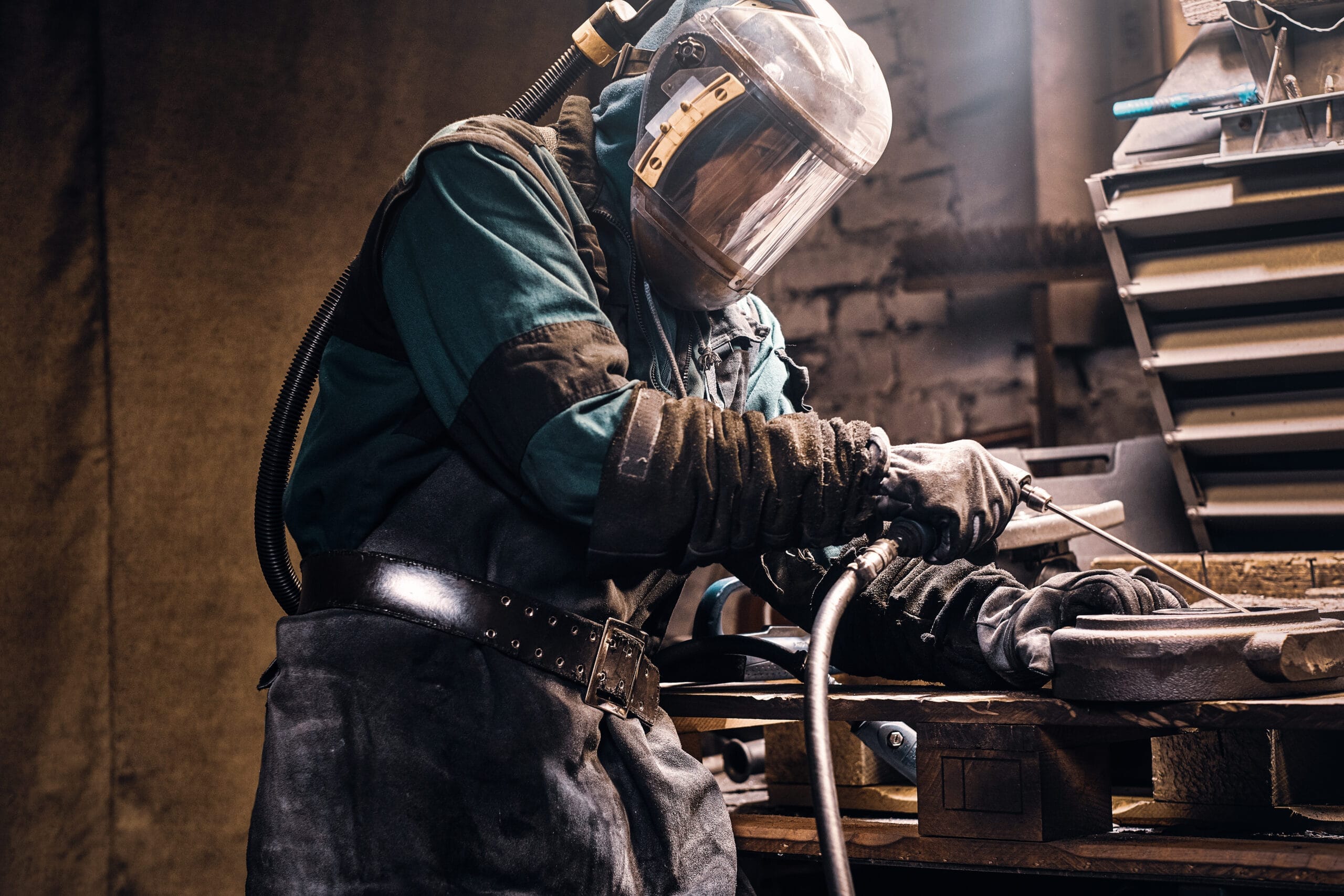 process creating new metal parts busy workshop made by worker scaled Uluslararası Kaynakçı Sertifikası